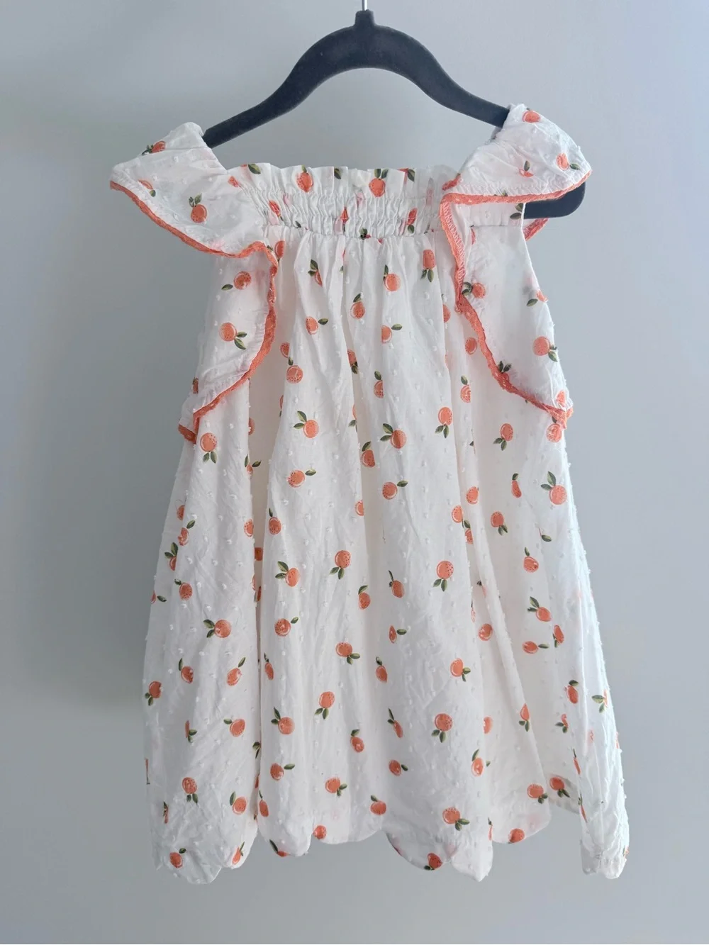 Rachel Zoe White Dress with Peach Print and Orange Straw Bag